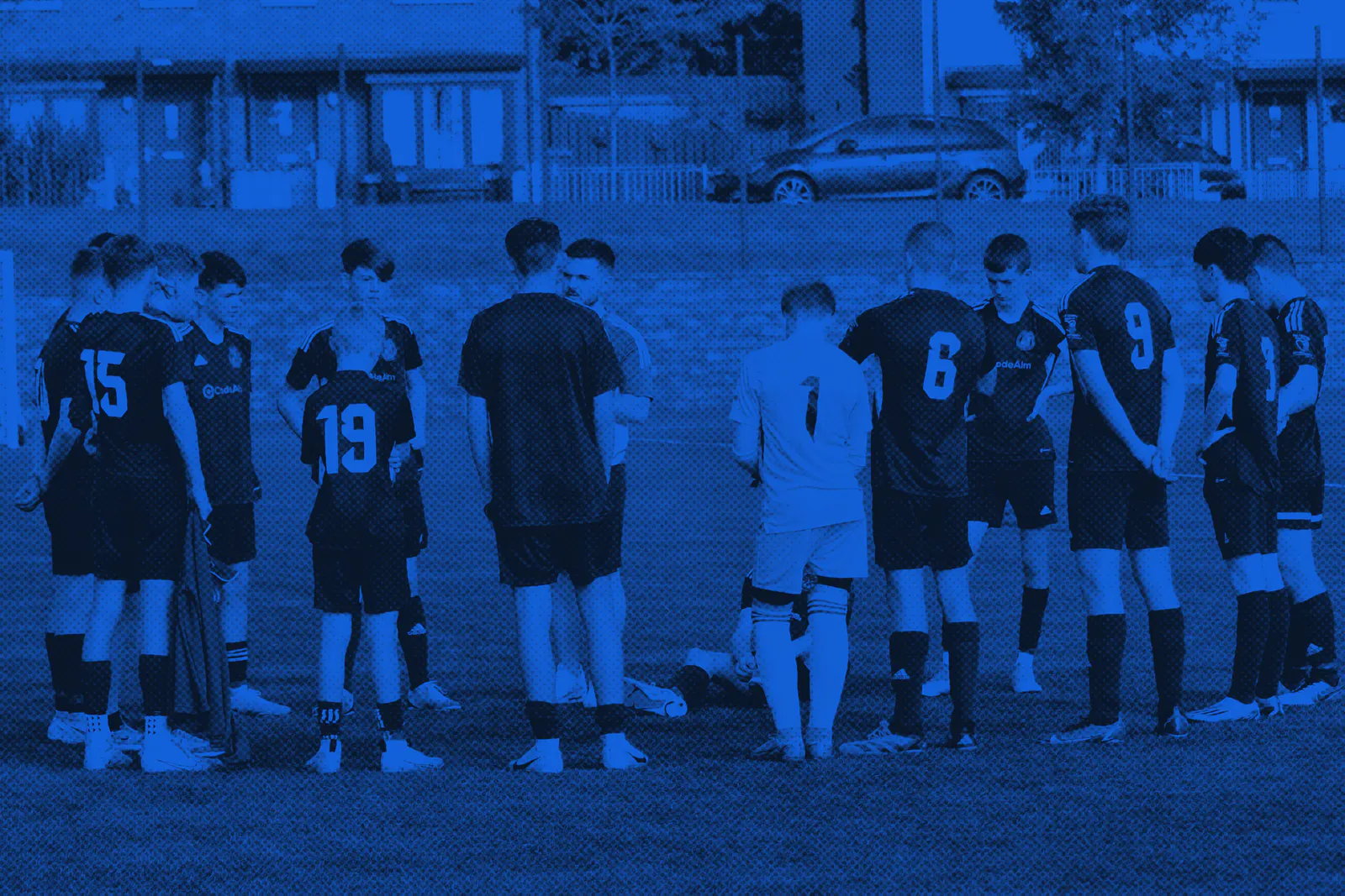 Newhill FC players and coaches together on the pitch